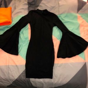 Black fashionnova flared dress! size XS
